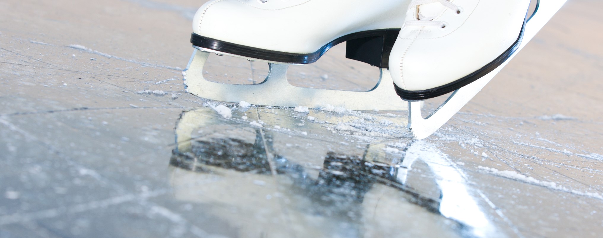 Tilted natural version, ice skates with reflection